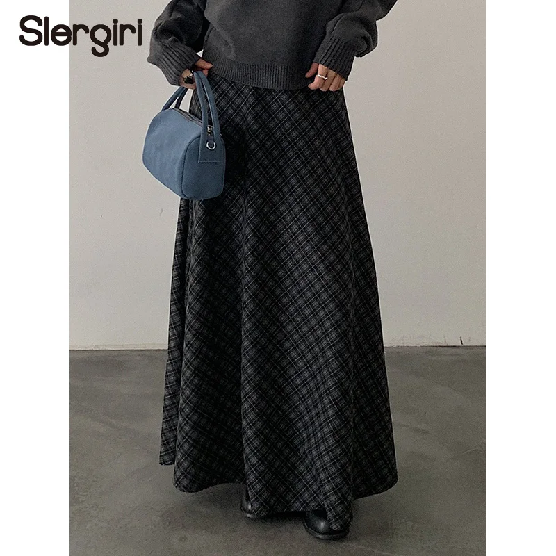 Шерстяная юбка в клетку в винтажном стиле преппи Slergiri, женская модная новинка 2026 года, осенне-зимняя, в корейском повседневном стиле, с широким подолом, макси, длинная
Шерстяная юбка в клетку в винтажном стиле преппи Slergiri, женская модная новинка 2026 года, осенне-зимняя, в корейском повседневном стиле, с широким подолом, макси, длинная
