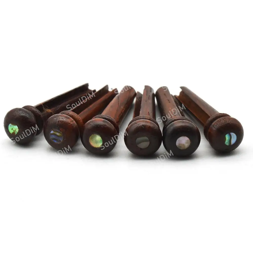 30pcs Acoustic Guitar Bridge Pins Pure Cocobolo Wood with Pearl Shell Dot Guitar String Nails Pin Guitarra Accessories
30pcs Acoustic Guitar Bridge Pins Pure Cocobolo Wood with Pearl Shell Dot Guitar String Nails Pin Guitarra Accessories