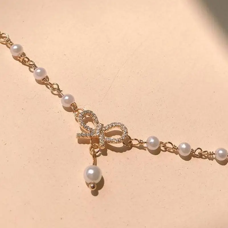 Корейский модный браслет с бантом и кристаллами, 2025 трендовые новые ювелирные изделия, женские браслеты с бантом из сладкого жемчуга для женщин, подарки лучшему другу
Корейский модный браслет с бантом и кристаллами, 2025 трендовые новые ювелирные изделия, женские браслеты с бантом из сладкого жемчуга для женщин, подарки лучшему другу