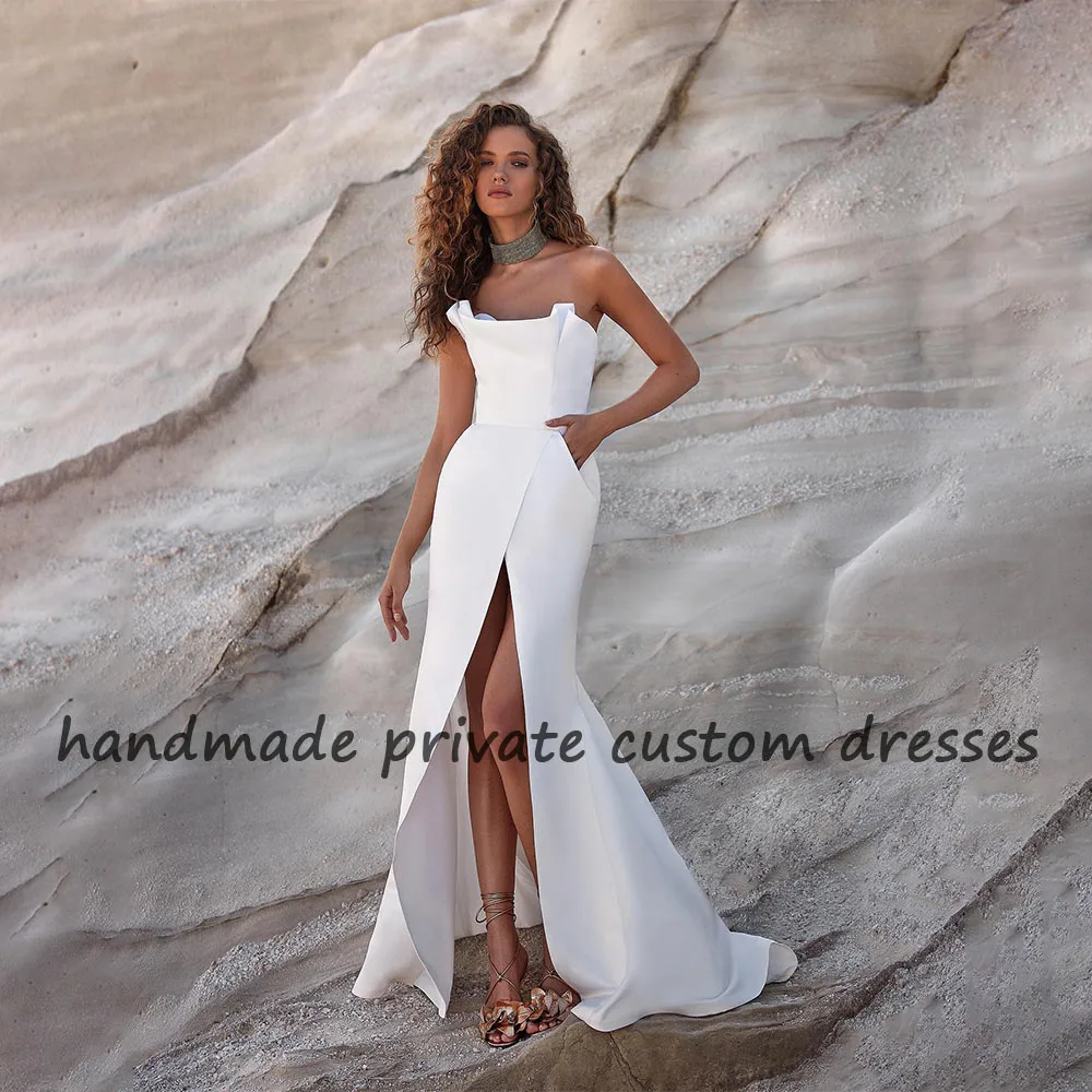 White Mermaid Wedding Dresses Mono Satin Strapless Beach Bride Dress Front Split Sexy Boho Wedding Bridal Gowns with Pockets
White Mermaid Wedding Dresses Mono Satin Strapless Beach Bride Dress Front Split Sexy Boho Wedding Bridal Gowns with Pockets