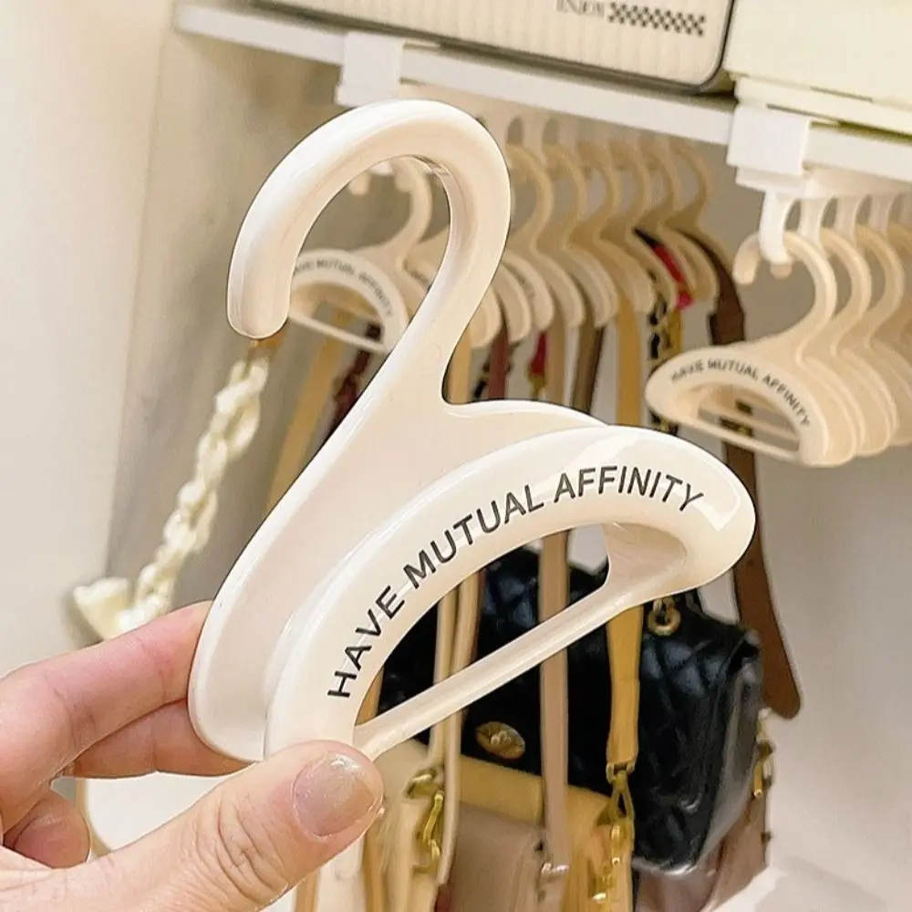 4Pcs Multifunction Wardrobe Handbag Organizer Arched Plastics Bag Hanger Hook Space Saving Widen Silk Scarf Hanging Storage Rack
4Pcs Multifunction Wardrobe Handbag Organizer Arched Plastics Bag Hanger Hook Space Saving Widen Silk Scarf Hanging Storage Rack
