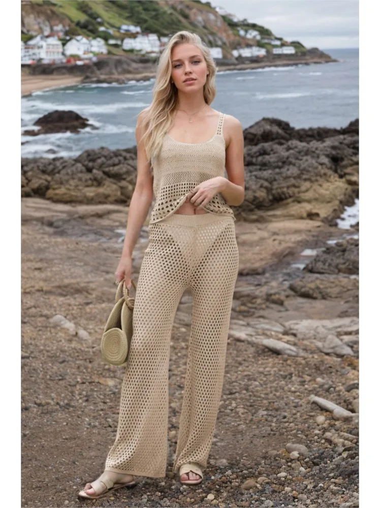 Сексуальный полый вязаный жилет и брюки, комплект из 2 предметов, женский летний модный повседневный топ с лямкой на шее для пляжного отдыха, два комплекта, 2025 г.
Сексуальный полый вязаный жилет и брюки, комплект из 2 предметов, женский летний модный повседневный топ с лямкой на шее для пляжного отдыха, два комплекта, 2025 г.