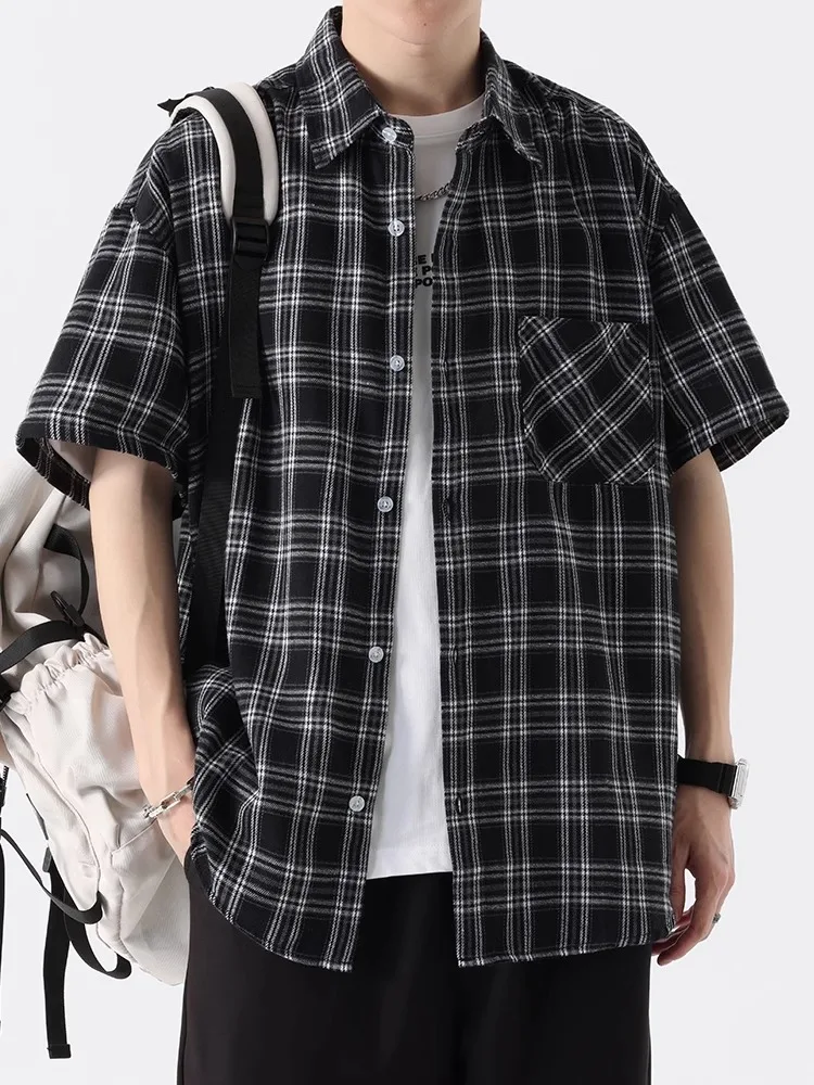 Летняя высококачественная повседневная рубашка-куртка больших размеров (до 300 фунтов), черно-белая в клетку, из дышащего хлопка, для молодежи
Летняя высококачественная повседневная рубашка-куртка больших размеров (до 300 фунтов), черно-белая в клетку, из дышащего хлопка, для молодежи