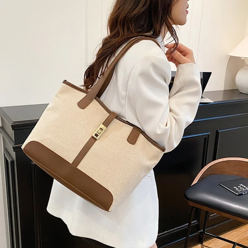 Minimalist Large Capacity Canvas Tote Bag with Brown Faux Leather Gold Turn Lock Detail Spacious Shoulder Purse for Daily Use
Minimalist Large Capacity Canvas Tote Bag with Brown Faux Leather Gold Turn Lock Detail Spacious Shoulder Purse for Daily Use