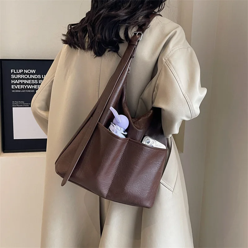 Korean Pu Leather Tote Bag for Women 2025 Large Capacity Female Vintage Shoulder Crossbody Bag Fashion Designer Ladies Handbag
Korean Pu Leather Tote Bag for Women 2025 Large Capacity Female Vintage Shoulder Crossbody Bag Fashion Designer Ladies Handbag