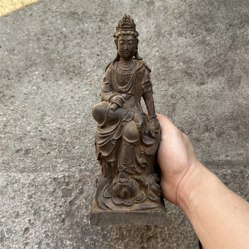 Vietnam agarwood carving sitting lotus free Guanyin Buddha statue ornament statue handheld scripture book gift
Vietnam agarwood carving sitting lotus free Guanyin Buddha statue ornament statue handheld scripture book gift