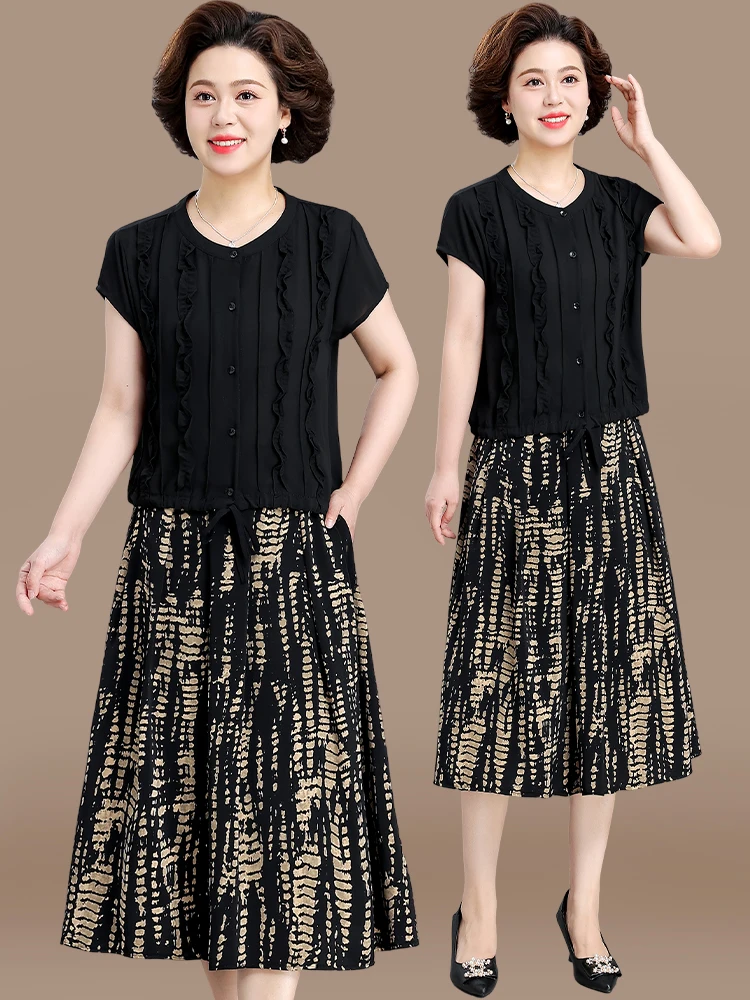 Летний комплект одежды для женщин среднего возраста: элегантный шифоновый топ, футболка с коротким рукавом и длинная юбка, модная женская одежда больших размеров.
Летний комплект одежды для женщин среднего возраста: элегантный шифоновый топ, футболка с коротким рукавом и длинная юбка, модная женская одежда больших размеров.