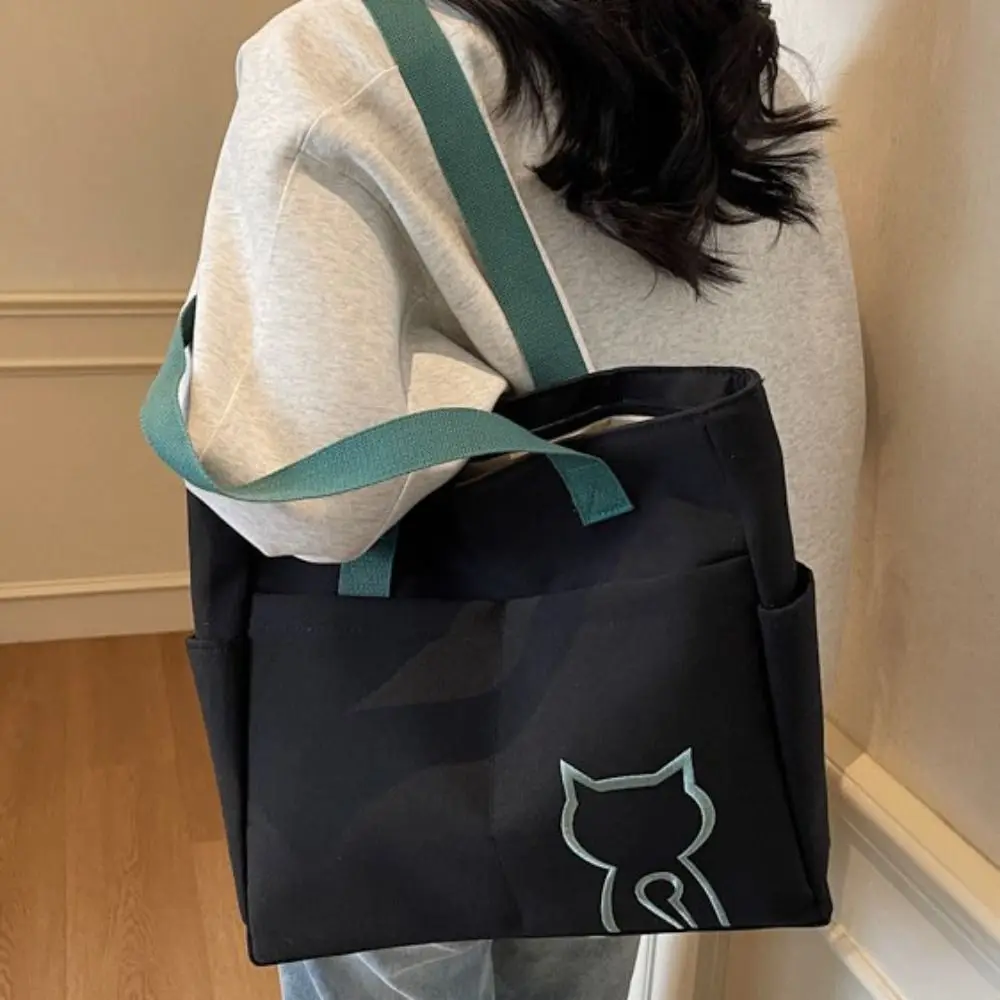 Casual Nylon Tote Bag Multi-Pocket Korean Style Lightweight Eco Bag Embroidery Cat Handbag Nylon Shoulder Bag Student
Casual Nylon Tote Bag Multi-Pocket Korean Style Lightweight Eco Bag Embroidery Cat Handbag Nylon Shoulder Bag Student