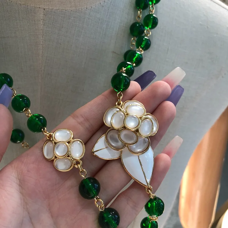 fresh glass beaded sweater chain white enamel glaze flower necklace earrings ear clip for women
fresh glass beaded sweater chain white enamel glaze flower necklace earrings ear clip for women