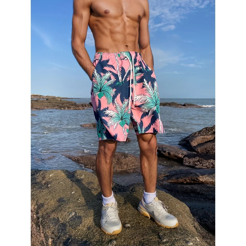 Retro tropical Hawaiian men's beach shorts with pink background and coconut print perfect for surfing and swimming
Retro tropical Hawaiian men's beach shorts with pink background and coconut print perfect for surfing and swimming