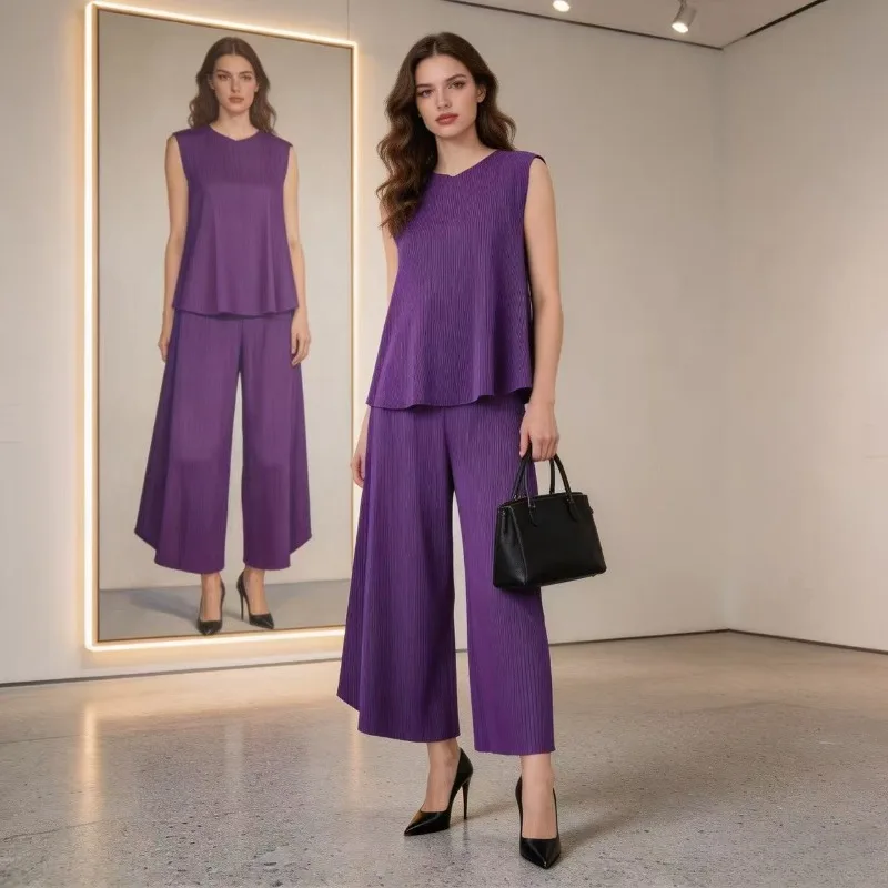 Комплект Miyake Pleated 2026: топ без рукавов с крупными плиссированными складками и однотонные расклешенные брюки с широкими штанинами для женщин
Комплект Miyake Pleated 2026: топ без рукавов с крупными плиссированными складками и однотонные расклешенные брюки с широкими штанинами для женщин