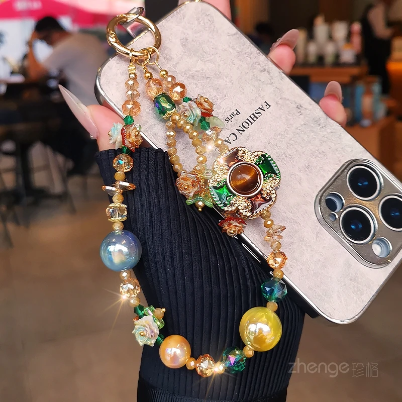 Мобильный кулон для женщин с высоким внешним видом, короткий дизайн из бисера, подвесная веревка с защитой от падения, универсальный новый продукт
Мобильный кулон для женщин с высоким внешним видом, короткий дизайн из бисера, подвесная веревка с защитой от падения, универсальный новый продукт