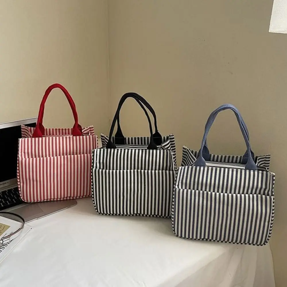 1Pcs Striped Canvas Lunch Bag Versatile Portable Tote Bag Minimalist Japanese-style Mom Handbag for Office Workers Students
1Pcs Striped Canvas Lunch Bag Versatile Portable Tote Bag Minimalist Japanese-style Mom Handbag for Office Workers Students