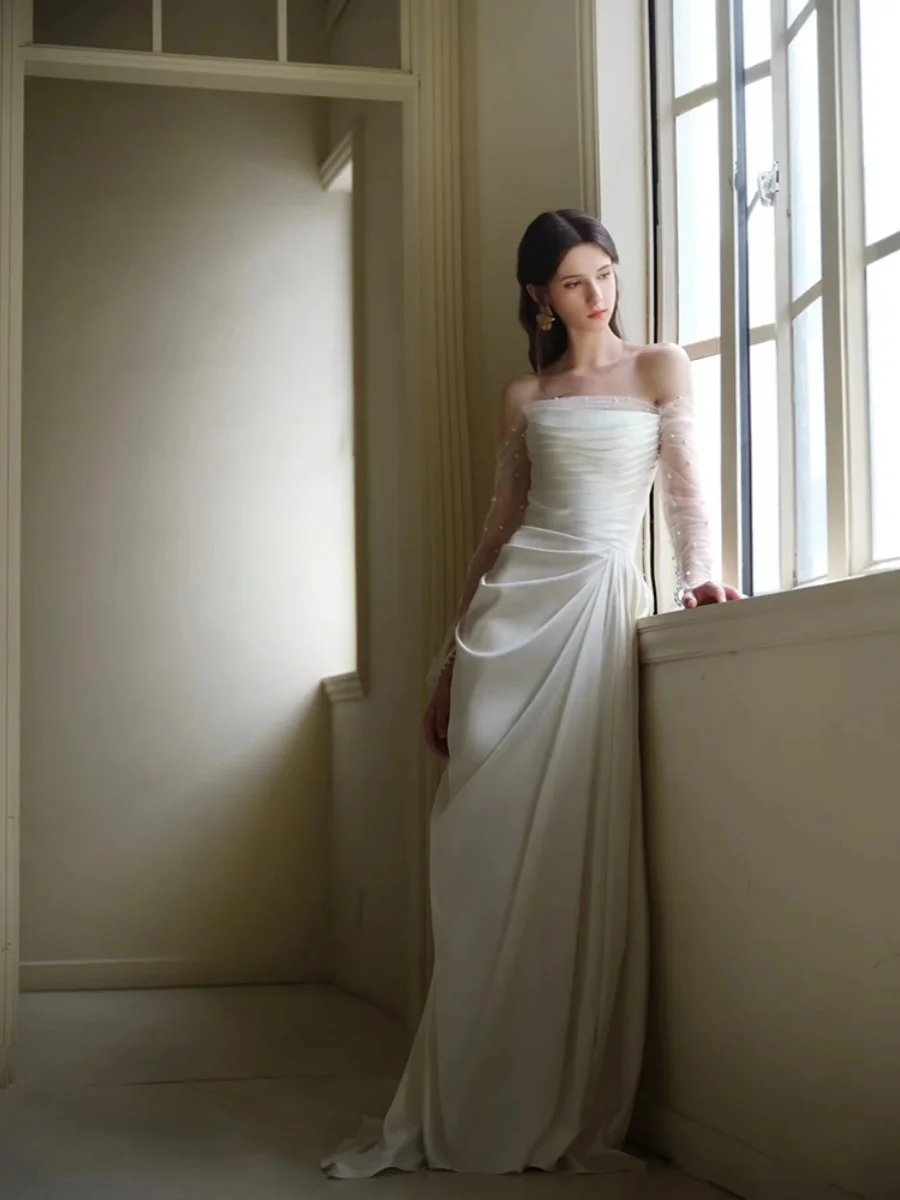 Elegant Simple White Bridal Gown Satin One-Shoulder Wedding Dress for Bride Hotel Indoor Wedding Dress with Sleeve Strap
Elegant Simple White Bridal Gown Satin One-Shoulder Wedding Dress for Bride Hotel Indoor Wedding Dress with Sleeve Strap