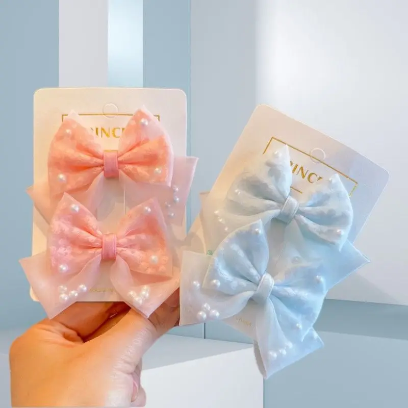 Girl Princess Sweet Pearl Hair Accessories Bow Hairclip Four Seasons Children's Side Clip Cute Simple Pair Clip
Girl Princess Sweet Pearl Hair Accessories Bow Hairclip Four Seasons Children's Side Clip Cute Simple Pair Clip