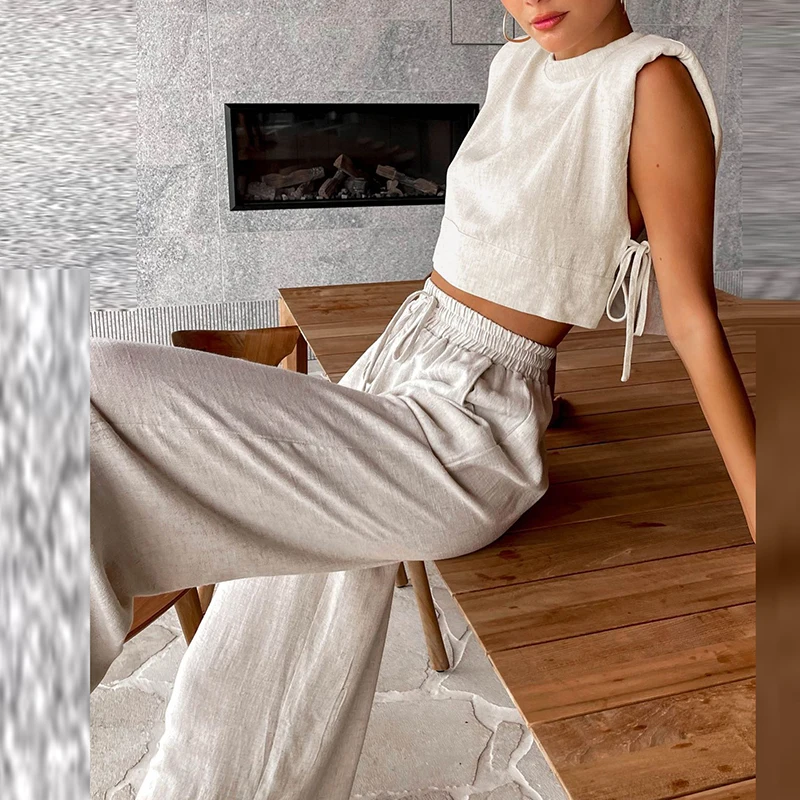Elegant O-neck Pullover Top & Long Pant Sets Women Casual Sleeveless Solid 2Pc Outfits Office Fashion Hollow Tie-up Loose Suits
Elegant O-neck Pullover Top & Long Pant Sets Women Casual Sleeveless Solid 2Pc Outfits Office Fashion Hollow Tie-up Loose Suits