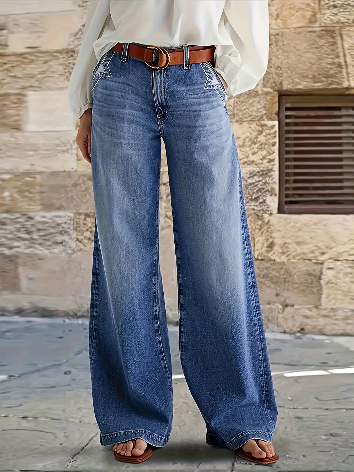 Ladies' loose and comfortable vintage washed non-stretchy mid-rise casual wide-leg denim jeans.
Ladies' loose and comfortable vintage washed non-stretchy mid-rise casual wide-leg denim jeans.
