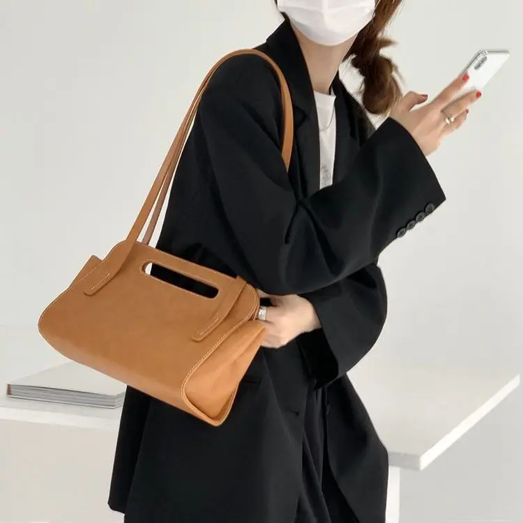 Niche Personality Handbag Elegant French Office Lady Large Capacity Crossbody Bolsas Solid All-match Popular Travel Pack
Niche Personality Handbag Elegant French Office Lady Large Capacity Crossbody Bolsas Solid All-match Popular Travel Pack