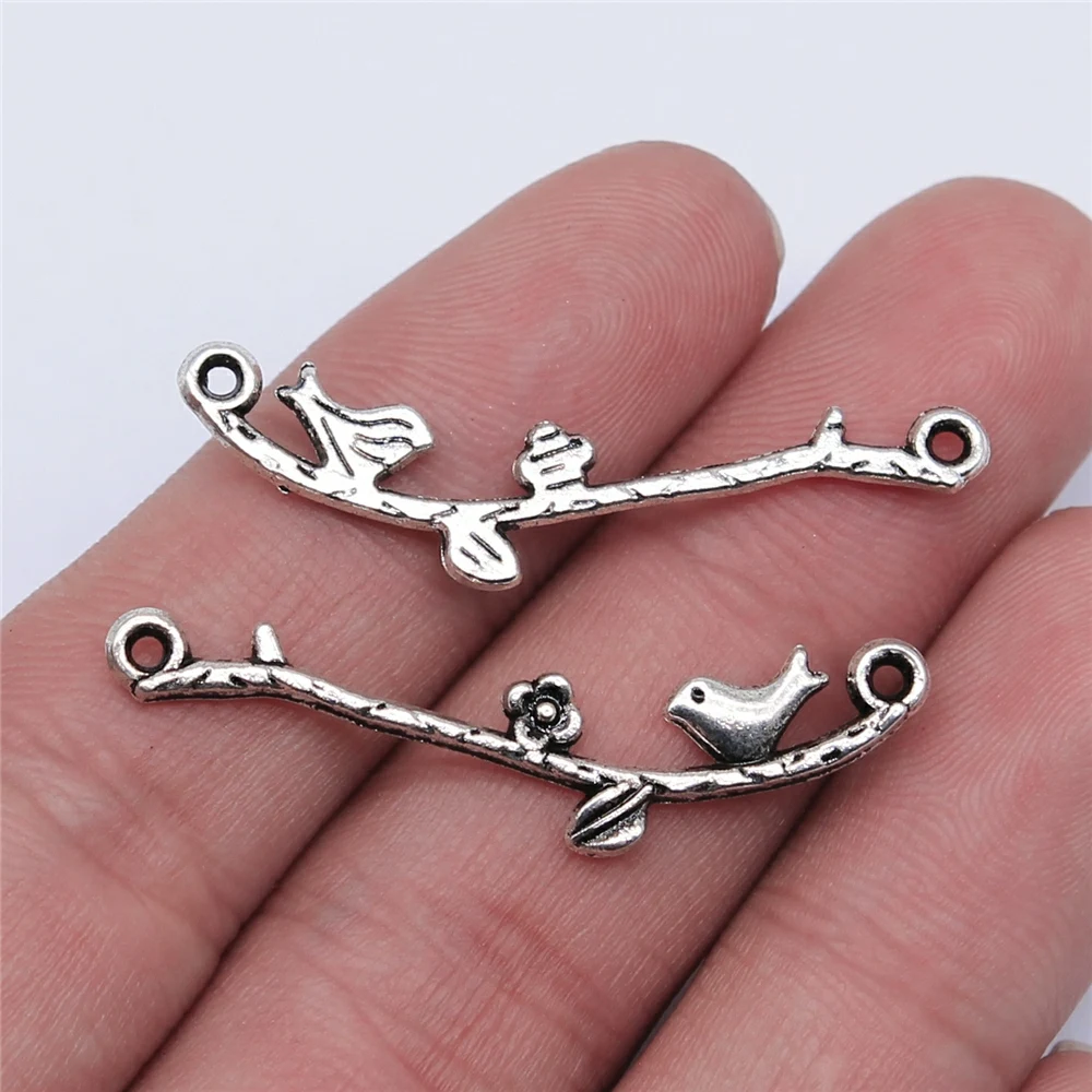 Wholesale 150pcs/bag 39x8mm Bird Flower Branch Connector Charm Jewelry Making Jewelry Accessories
Wholesale 150pcs/bag 39x8mm Bird Flower Branch Connector Charm Jewelry Making Jewelry Accessories