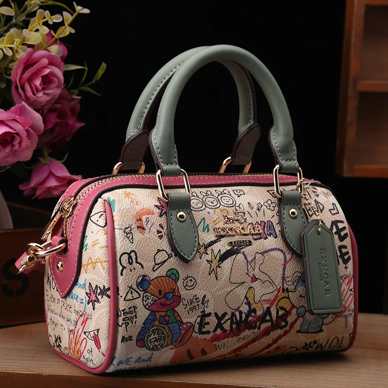 Luxury and Vintage Handheld Boston Bag with Fashion Cartoon Graffiti and premium Leather 2026 Women's Newly Trendy Crossbody Bag
Luxury and Vintage Handheld Boston Bag with Fashion Cartoon Graffiti and premium Leather 2026 Women's Newly Trendy Crossbody Bag