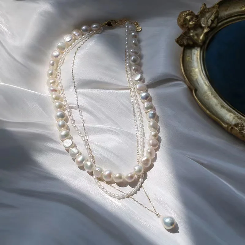 Multi-layered natural freshwater irregular Baroque pearl necklace with French retro elegance and stylish overlay wear choker PC
Multi-layered natural freshwater irregular Baroque pearl necklace with French retro elegance and stylish overlay wear choker PC