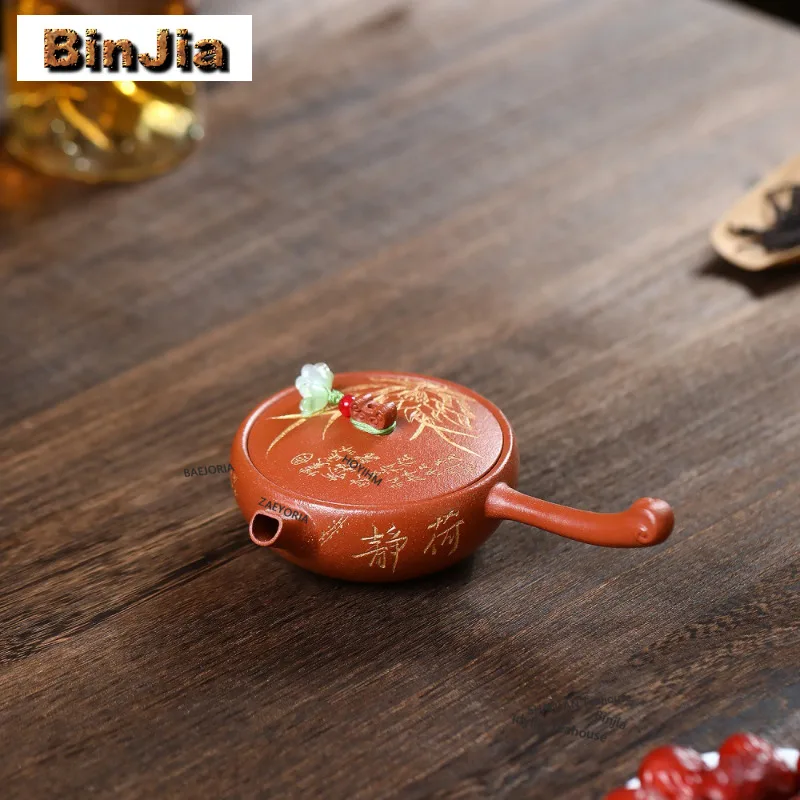 110ml Ancient Yixing Purple Clay Teapots Handmade Side Handle Pot Raw Ore Red Downhill Mud Tea Maker Kettle Zisha Tea Set Craft
110ml Ancient Yixing Purple Clay Teapots Handmade Side Handle Pot Raw Ore Red Downhill Mud Tea Maker Kettle Zisha Tea Set Craft