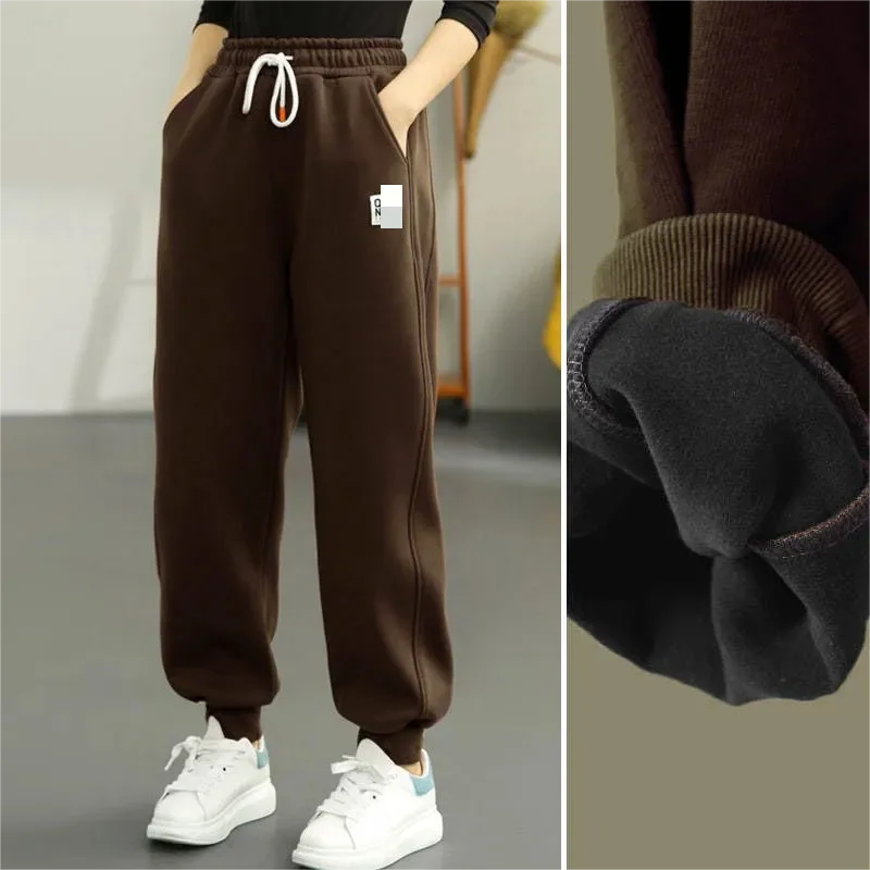Autumn and winter with thickened simple drawstring elastic waist casual pants women's girdle feet slimming sports pants
Autumn and winter with thickened simple drawstring elastic waist casual pants women's girdle feet slimming sports pants