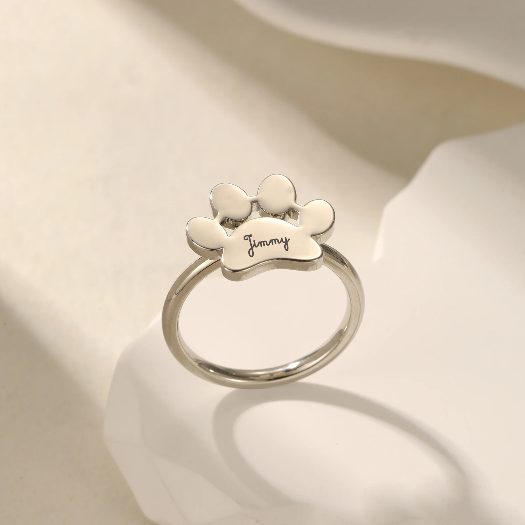 Welded Puppy Paw Ring with Engravable Name Band Size Optional 2.5mm Width 18K Gold Plated Stainless Steel Pet Memorial Gift
Welded Puppy Paw Ring with Engravable Name Band Size Optional 2.5mm Width 18K Gold Plated Stainless Steel Pet Memorial Gift