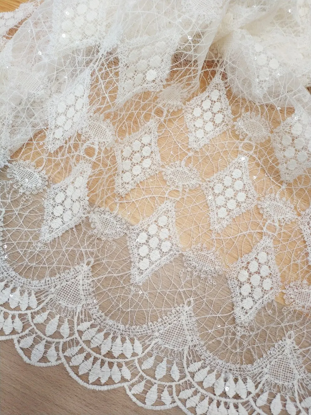 Bohemian sequin embroidered hollow lace fabric for wedding dresses, evening gowns, dresses, high-end fashion fabrics
Bohemian sequin embroidered hollow lace fabric for wedding dresses, evening gowns, dresses, high-end fashion fabrics