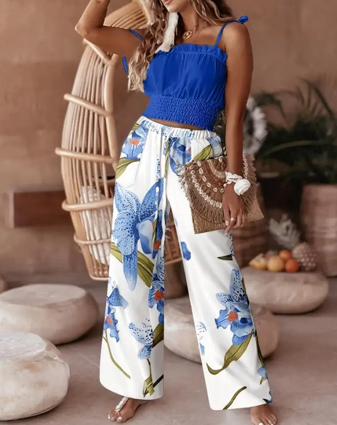 Fashion Summer Women's 2 Pieces Outfit Plain Spaghetti Strap Shirred Crop Top and Casual Floral Print Pocket Design Pants Set
Fashion Summer Women's 2 Pieces Outfit Plain Spaghetti Strap Shirred Crop Top and Casual Floral Print Pocket Design Pants Set