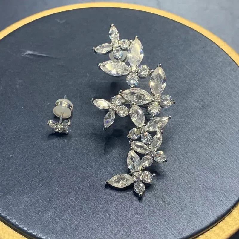 European and American fashion asymmetrical butterfly stud earrings women, butterfly ear clips silver-white diamond temperament
European and American fashion asymmetrical butterfly stud earrings women, butterfly ear clips silver-white diamond temperament