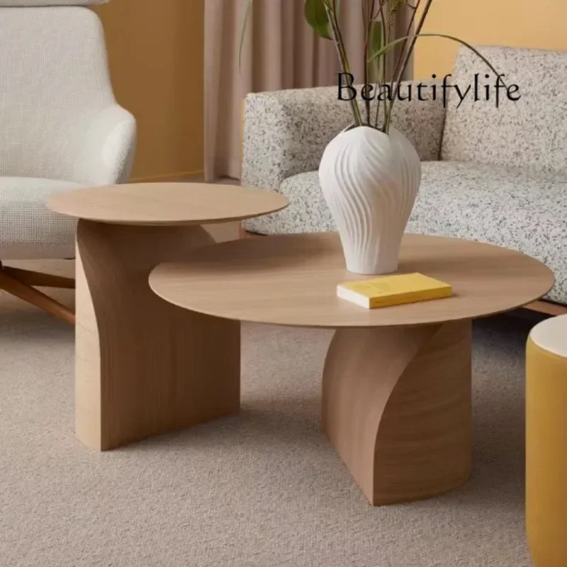Nordic minimalist small apartment special-shaped coffee table medieval retro round solid wood coffee table combination
Nordic minimalist small apartment special-shaped coffee table medieval retro round solid wood coffee table combination