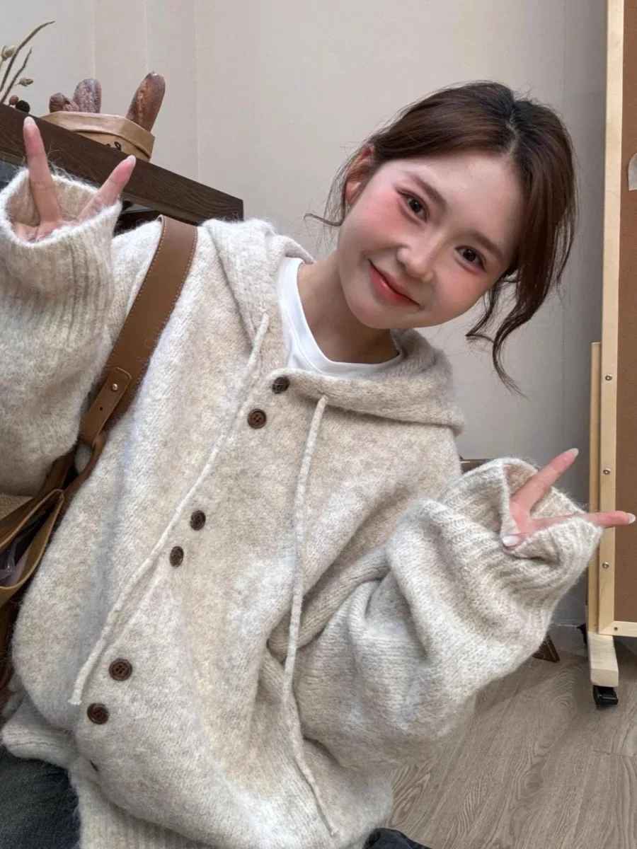 Hooded Knitted Cardigan Women's Autumn and Winter Thick Korean Series Lazy Loose Medium length Sweater
Hooded Knitted Cardigan Women's Autumn and Winter Thick Korean Series Lazy Loose Medium length Sweater