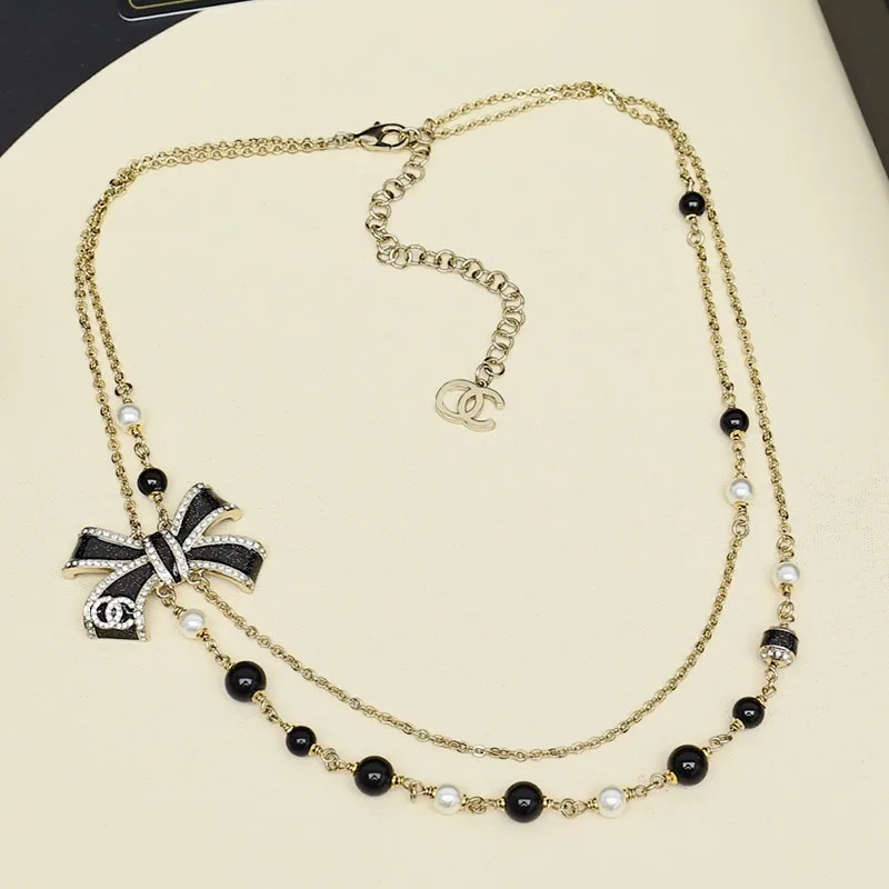 New Black and Gold Magic Enamel Bow Double-layer Necklace Design Sense Daily Versatile Atmosphere Full of Necklace Accessories W
New Black and Gold Magic Enamel Bow Double-layer Necklace Design Sense Daily Versatile Atmosphere Full of Necklace Accessories W