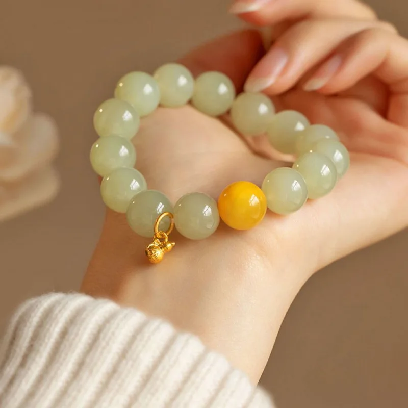 High-end translucent grape Hetian jade, amber, solid gold round bead bracelet with clear water ice texture and oily luster,
High-end translucent grape Hetian jade, amber, solid gold round bead bracelet with clear water ice texture and oily luster,