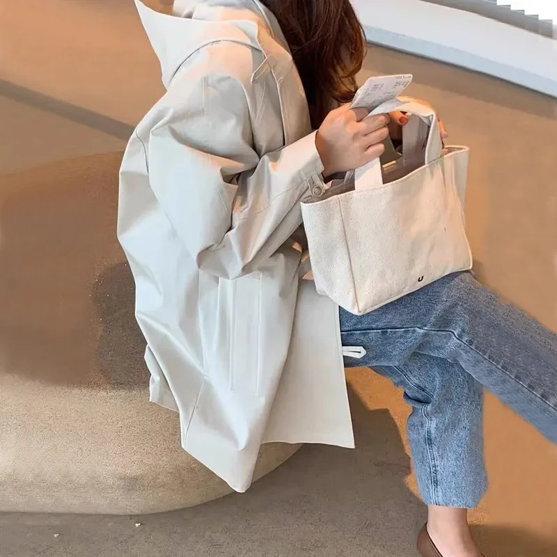 Весенне-осенняя женская ветровка на свободной подкладке, 2021, женский плащ с капюшоном, новая женская модная повседневная куртка средней длины цвета хаки 
Весенне-осенняя женская ветровка на свободной подкладке, 2021, женский плащ с капюшоном, новая женская модная повседневная куртка средней длины цвета хаки