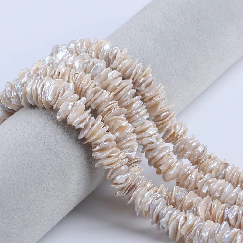 11-12mm Skin Color Flat Keshi Pearl Natural Freshwater Pearl Strands With Center Hole for Jewelry Making
11-12mm Skin Color Flat Keshi Pearl Natural Freshwater Pearl Strands With Center Hole for Jewelry Making