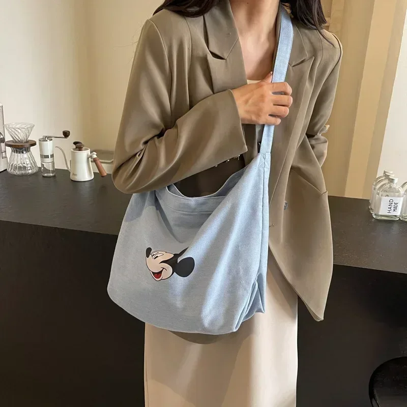 Disney Mickey Mouse Cartoon Cute Denim Messenger Bag Women's New Shoulder Bag Fashion Canvas Shopping Storage Bag
Disney Mickey Mouse Cartoon Cute Denim Messenger Bag Women's New Shoulder Bag Fashion Canvas Shopping Storage Bag