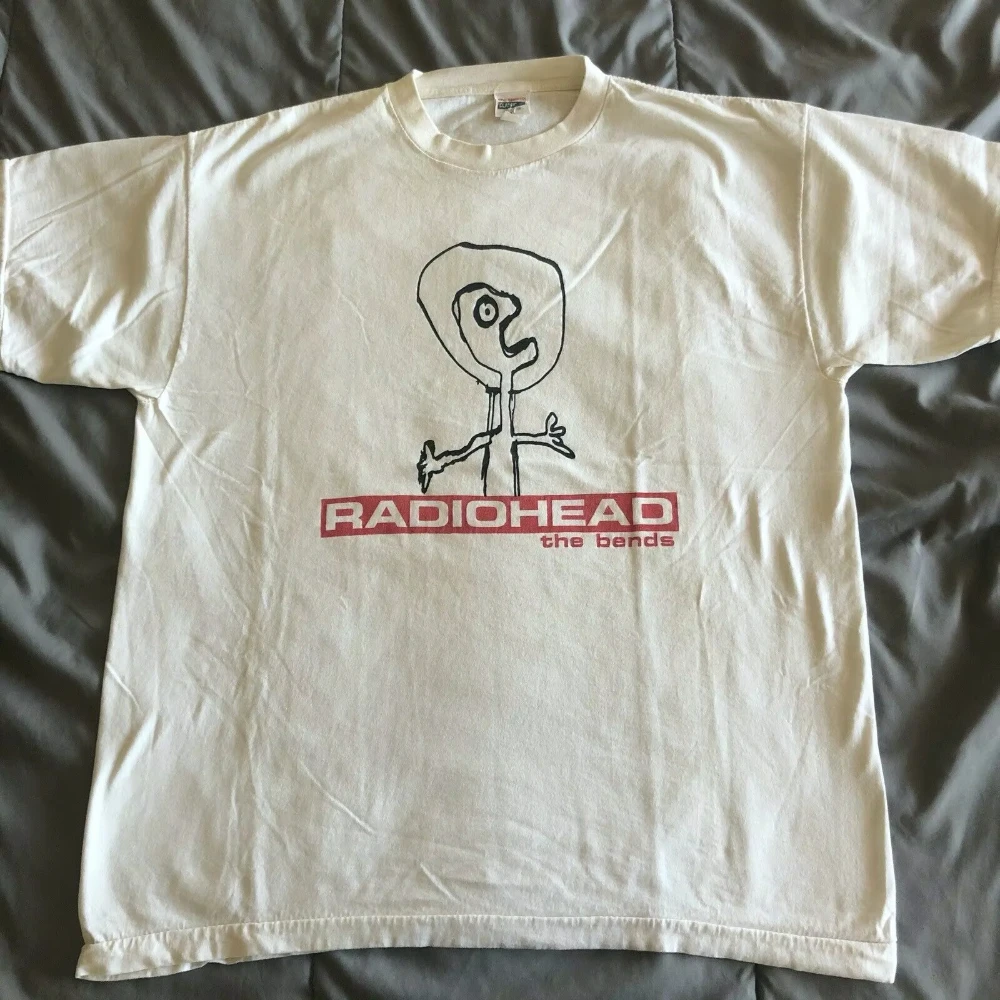 Новая хлопковая суперэластичная повседневная футболка унисекс с принтом RADIOHEAD THE BENDS, повседневная свободная футболка большого размера с круглым вырезом и принтом
Новая хлопковая суперэластичная повседневная футболка унисекс с принтом RADIOHEAD THE BENDS, повседневная свободная футболка большого размера с круглым вырезом и принтом