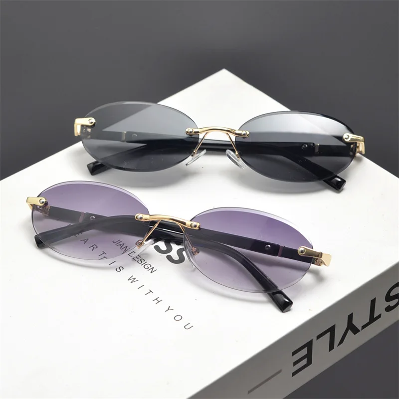 Fashion Rimless Oval Women Sun Glasses Summer Outdoor Accessory Sunglasses Small Frame Trendy Boy Girl Beach Vacation Eyewear
Fashion Rimless Oval Women Sun Glasses Summer Outdoor Accessory Sunglasses Small Frame Trendy Boy Girl Beach Vacation Eyewear