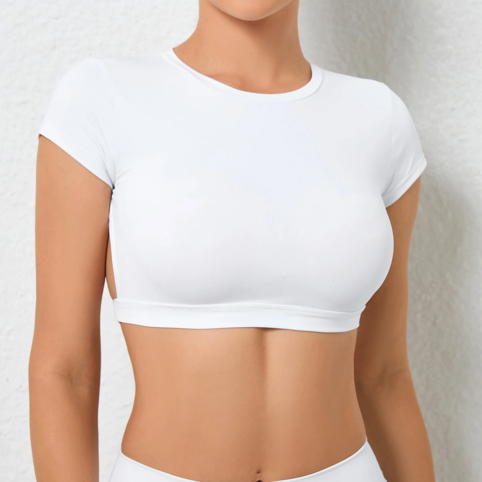 New European and American Nude Yoga Large Backless Quick-drying Tight-fitting Sports Top, Running Fitness T-shirt with Chest Pad
New European and American Nude Yoga Large Backless Quick-drying Tight-fitting Sports Top, Running Fitness T-shirt with Chest Pad