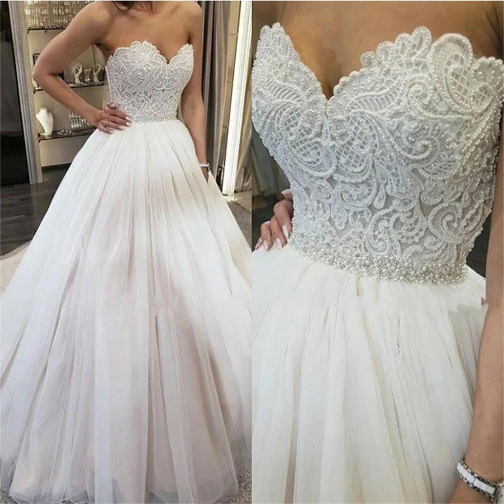 Customized ZJ9001 Beach Sweetheart Ball Gown Wedding Dress Beads Applique Formal Bride Dresses Hot
Customized ZJ9001 Beach Sweetheart Ball Gown Wedding Dress Beads Applique Formal Bride Dresses Hot