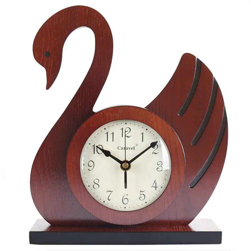Современные простые часы для гостиной, деревянные бесшумные настольные часы, часы с декором в виде лебедя
Современные простые часы для гостиной, деревянные бесшумные настольные часы, часы с декором в виде лебедя