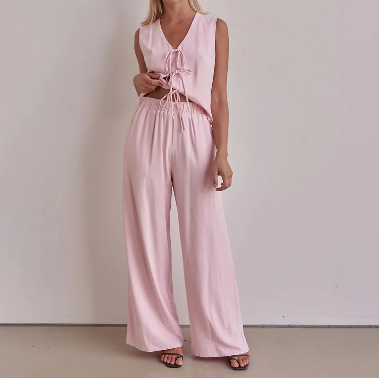 2025 New Pink Women's Trousers Suit European And American Fashion Sleeveless Vest Lace-up Top Loose Trousers Two-piece Suit
2025 New Pink Women's Trousers Suit European And American Fashion Sleeveless Vest Lace-up Top Loose Trousers Two-piece Suit