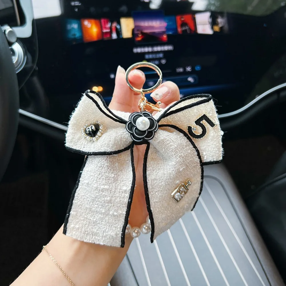 Creative Kawai Butterfly Knot Keychain Pearl Chain Korean Style Car Keychain Ornaments Personalized Ribbon Bag Pendant Gift
Creative Kawai Butterfly Knot Keychain Pearl Chain Korean Style Car Keychain Ornaments Personalized Ribbon Bag Pendant Gift