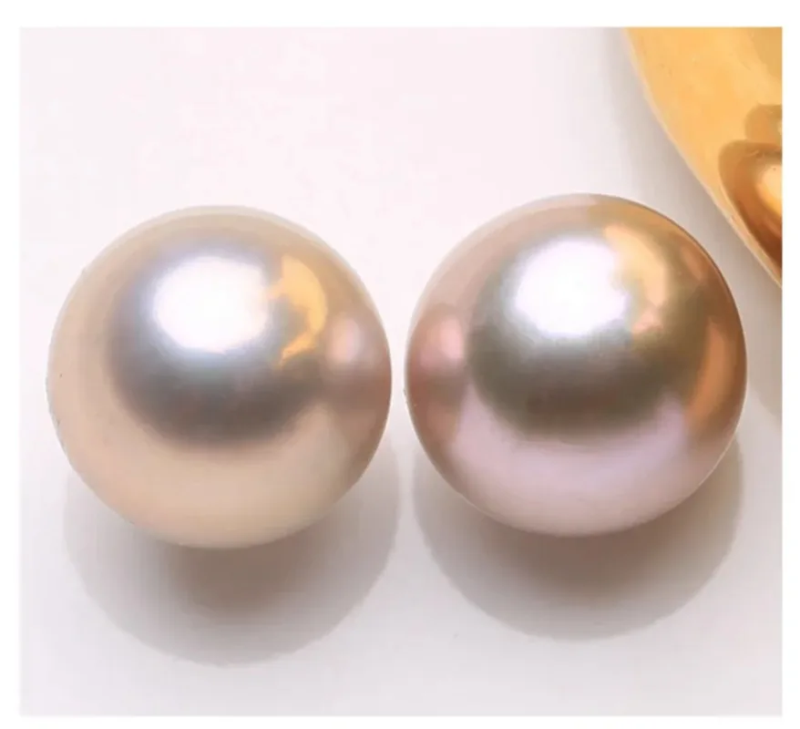 Pair of 13-14mm South Sea Gold Pink Bottom Pearl Half Drilled
Pair of 13-14mm South Sea Gold Pink Bottom Pearl Half Drilled