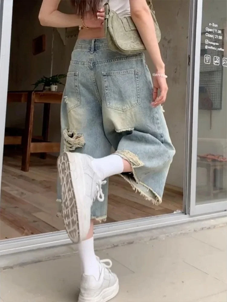American Style High Waist Torn Hemming Seven-Foot Women's Jeans Summer plus Size Wide Leg Design Straight Tulip Shorts
American Style High Waist Torn Hemming Seven-Foot Women's Jeans Summer plus Size Wide Leg Design Straight Tulip Shorts