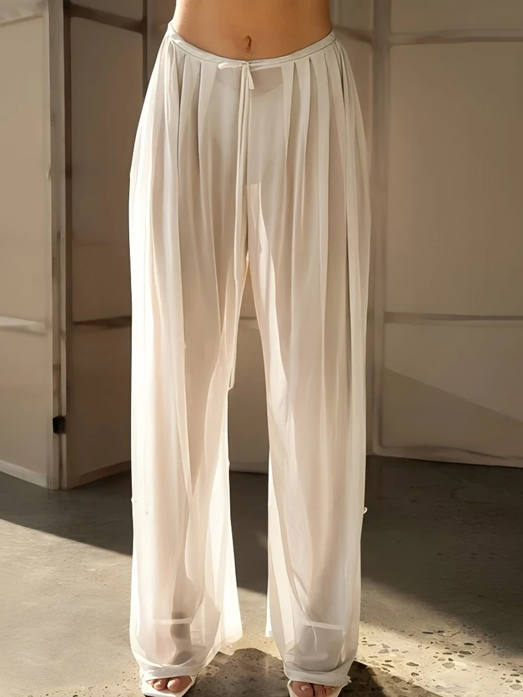 JULISSA MO Sexy See Through Wide leg Women Pant White High Waist Lace Up Long Trouser Female Summer Loose Casual Streetwear 2025
JULISSA MO Sexy See Through Wide leg Women Pant White High Waist Lace Up Long Trouser Female Summer Loose Casual Streetwear 2025