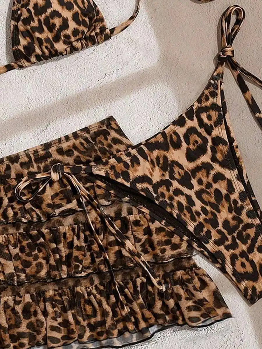 Leopard Print Tie-Strap Triangle Bikini Top And Multi-Layered Ruffled Mini Skirt Set For Beach Festival Wear
Leopard Print Tie-Strap Triangle Bikini Top And Multi-Layered Ruffled Mini Skirt Set For Beach Festival Wear