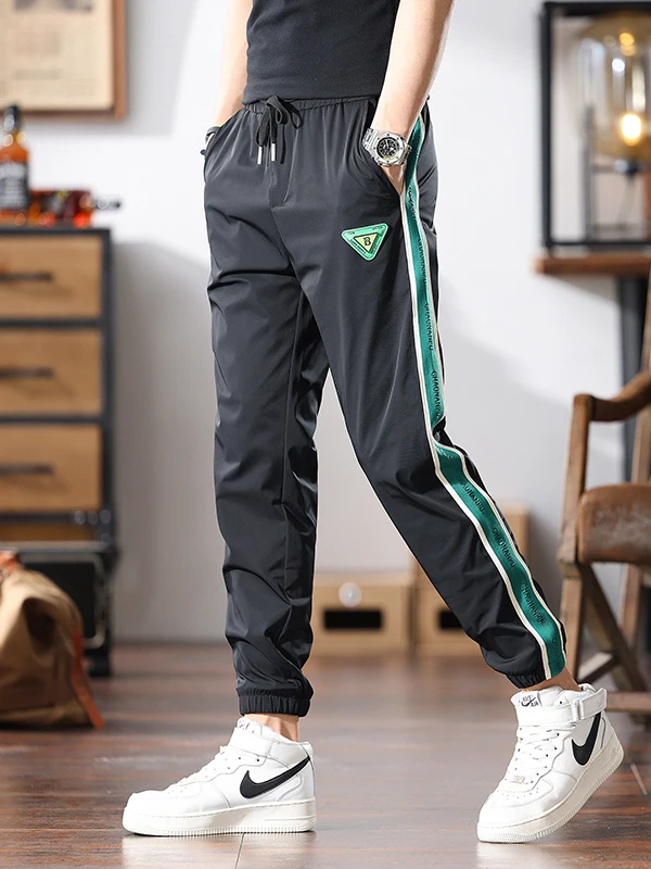 Bla Stripe Ice Silk Men's Casual Pants Elastic Thin Sle Qui Dry Sports Trousers Smooth Surface Slim Fit Cuffed Harem Pants
Bla Stripe Ice Silk Men's Casual Pants Elastic Thin Sle Qui Dry Sports Trousers Smooth Surface Slim Fit Cuffed Harem Pants